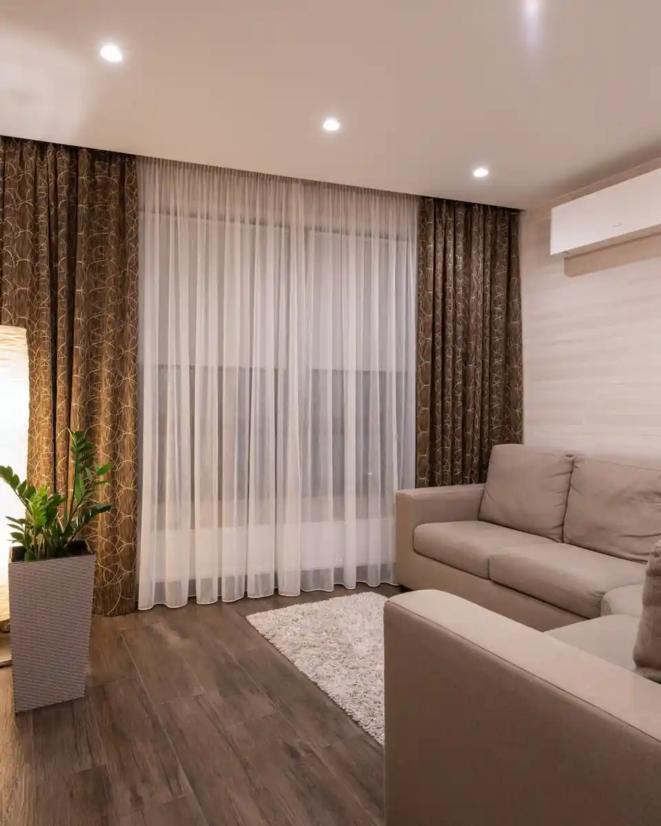 Cozy living room with a wall-mounted air conditioner