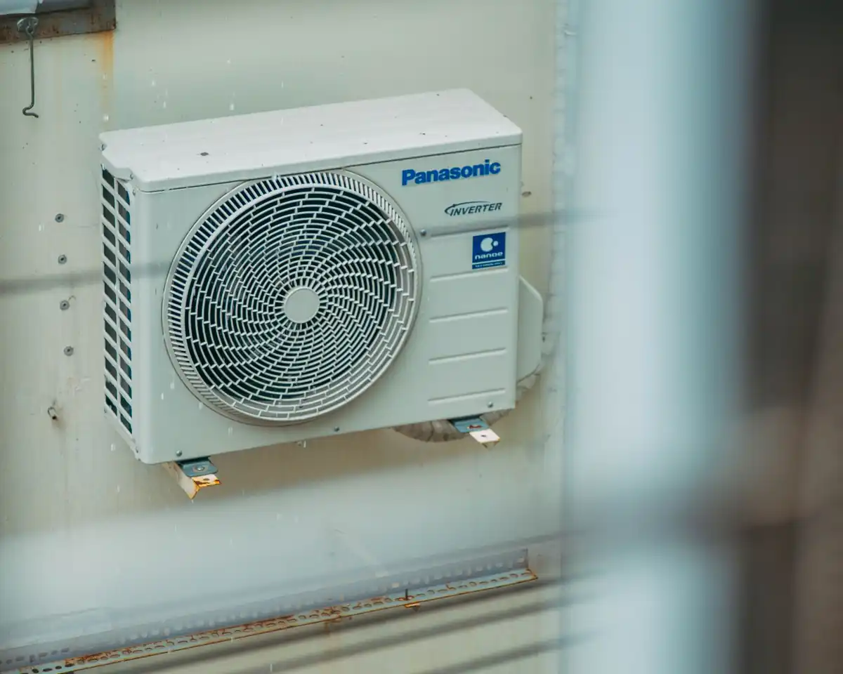 Wall-mounted outdoor air conditioner on a building exterior