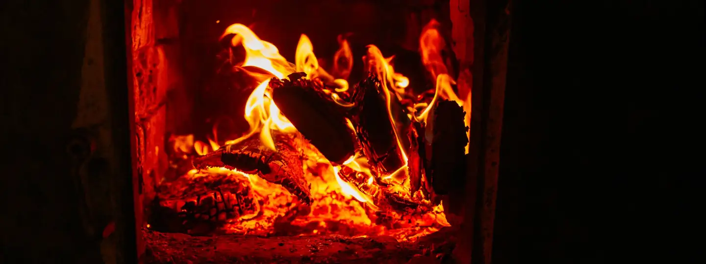 Warm fire burning in a fireplace