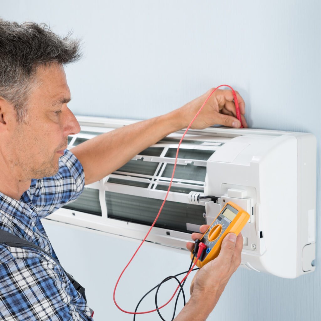 Hand adjusting a radiator thermostat valve for home heating